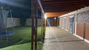 een lege hal van een gebouw 's nachts bij CASA COMPLEJO LoS PRIMOS in Pozo del Carril