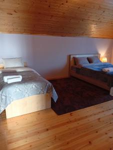 Tempat tidur dalam kamar di Beloved Home