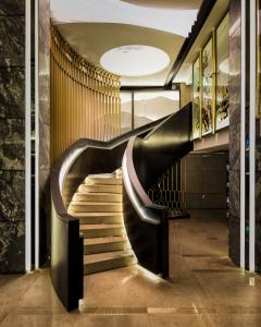 a staircase leading up to a stair case at Hotel Fusion, a C-Two Hotel in San Francisco