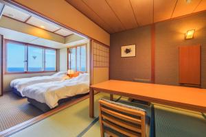 Letto o letti in una camera di Hamanoyu