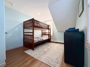 En eller flere senge i et værelse på Seabreeze Sanctuary