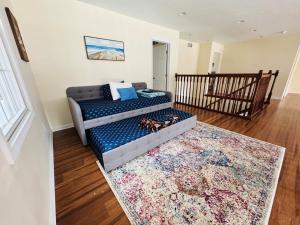 En eller flere senge i et værelse på Large Family Gathering Home on Kelleys Island