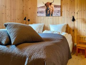 Postel nebo postele na pokoji v ubytování Cosy Cabin By Golsfjellet Ski Resort