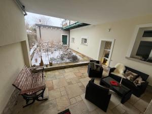 an aerial view of a living room with a patio at Saar-Lor-Lux-Perle in Merzig