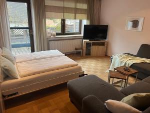 Et tv og/eller underholdning på Ferienwohnung JuraSchatz