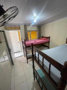 Giường trong phòng chung tại Pousada Angra Moura +33 ảnh