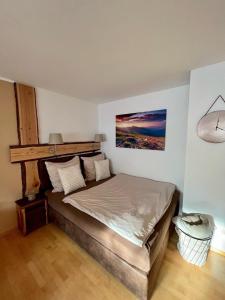 a bedroom with a large bed in a room at Cozy Apartment in Inzell in Inzell