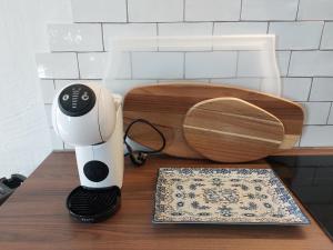a white and black blender sitting on a counter at Apartment La Casa Blanca in Playa del Hombre