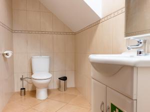 a bathroom with a toilet and a sink at View to the Valley, By OP in Senhora do Rosário +17 photos