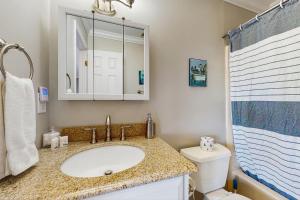 a bathroom with a sink and a toilet at Cloud Nine Mountain Home in Sugar Mountain