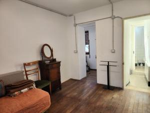 a room with a bed and a cross on the wall at Villa Coccodrilla Varallese in Varallo +37 photos