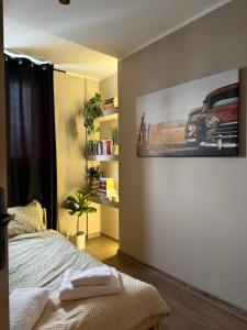 En eller flere senge i et værelse på Apartament MOCHA Szczytno Mazury