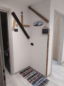 a wine rack in the middle of a room at Lika in Livigno