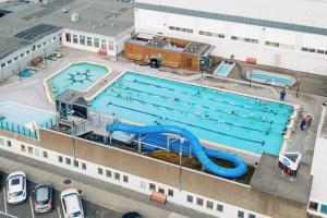 an overhead view of a swimming pool on a building at Quiet, two bedroom apartment in Reykjavík