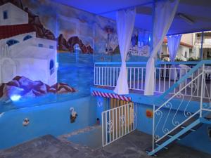 a view of a water park with a slide at Patty's House Kallikratia in Vergia