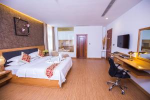 TV a/nebo společenská místnost v ubytování Orussey One Hotel & Apartment + 37 fotografií
