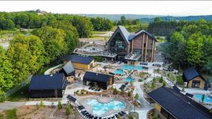 an aerial view of a resort with a swimming pool at Luxury Jacuzzi Suite with Sauna & Heated Pool in Shanty Bay