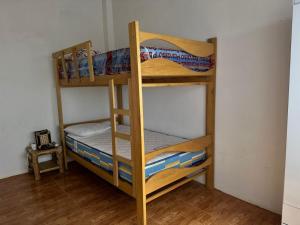 a couple of bunk beds in a room at Casa Vichayito - Los Órganos in Los Órganos