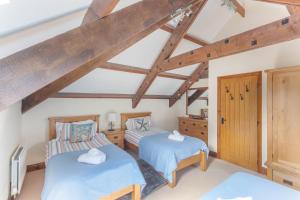 Postel nebo postele na pokoji v ubytování Puffin Cottage, Bamburgh