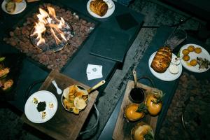 a table with food on it with plates of food at Caesars Republic Lake Tahoe, A Caesars Destination in Stateline