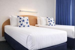 En eller flere senge i et værelse på Busselton Motel + 4 billeder