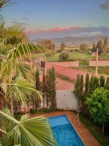 a view of a swimming pool in a yard at Villa Gomez in Sbiti