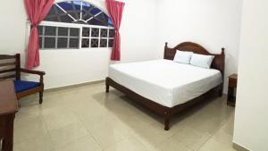 Hotel Hacienda Bacalar tesisinde bir odada yatak veya yataklar +21 fotoğraf