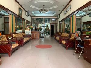 a large lobby with couches and a store at Kim Anh Hotel in Hanoi