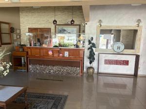 a store with a counter in a room at Hotel Ideal vcp in Villa Carlos Paz