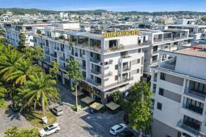 an aerial view of a building with a parking lot at Helen Halong Hotel in Ha Long