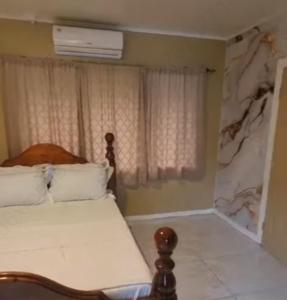 A bed or beds in a room at Dream Big Accommodation