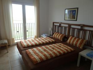 Postel nebo postele na pokoji v ubytování Hostal Moratinos