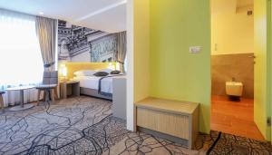 Letto o letti in una camera di Hotel Grad