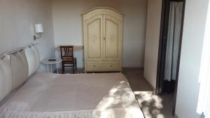 Postel nebo postele na pokoji v ubytování B&B Ai Prati