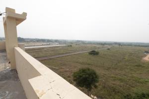 a view of a field from the top of a building at MAS Residency Home in Pudukkottai +4 photos