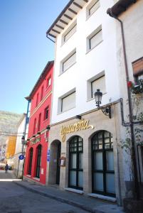 a building on the side of a street at Hotel Iguareña in Ezcaray