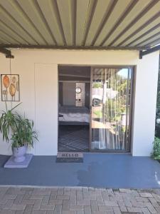 a view from the outside of a house with a patio at 42AtSouth in Vryheid