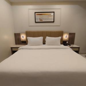 En eller flere senge i et værelse på Park View