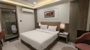 En eller flere senge i et værelse på Park View