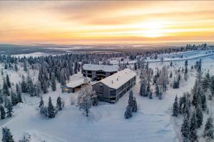 an aerial view of a house in the snow at AuroraLevi Suites Utsuvaara Northern Lights Retreat, Ski-In-out, 2 ski pass included to price in Levi