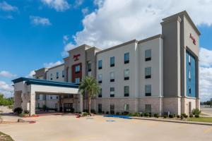 a rendering of the front of a hotel at Hampton Inn Lake Charles in Lake Charles