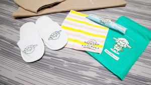 a pair of white flip flops and a pair of socks at Hotel Route-Inn Gotenba Eki-Minami in Gotemba