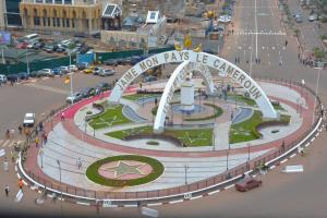 a sign for the new las vegas las conventions at Studio Chic avec parking in Yaoundé +2 photos