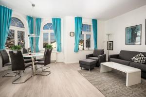 Et opholdsområde på Ferienwohnung 10 Haus Metropol