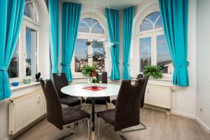 Et opholdsområde på Ferienwohnung 10 Haus Metropol