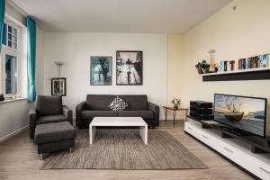 Et opholdsområde på Ferienwohnung 10 Haus Metropol