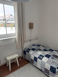 Postelja oz. postelje v sobi nastanitve Strandperle