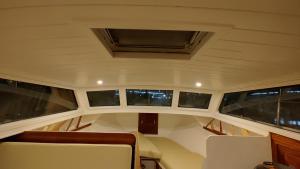 a view of the inside of a boat with windows at Over the Sea in Barcelona