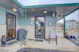 a front porch of a building with a glass door at Bel Aire Motel Chamberlain Near Missouri River I 90 in Chamberlain