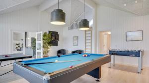 a billiard room with a pool table in it at Villavilla 530 - Mommark, Sydjylland in Sarup